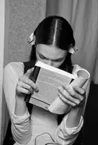 A learner reading a book